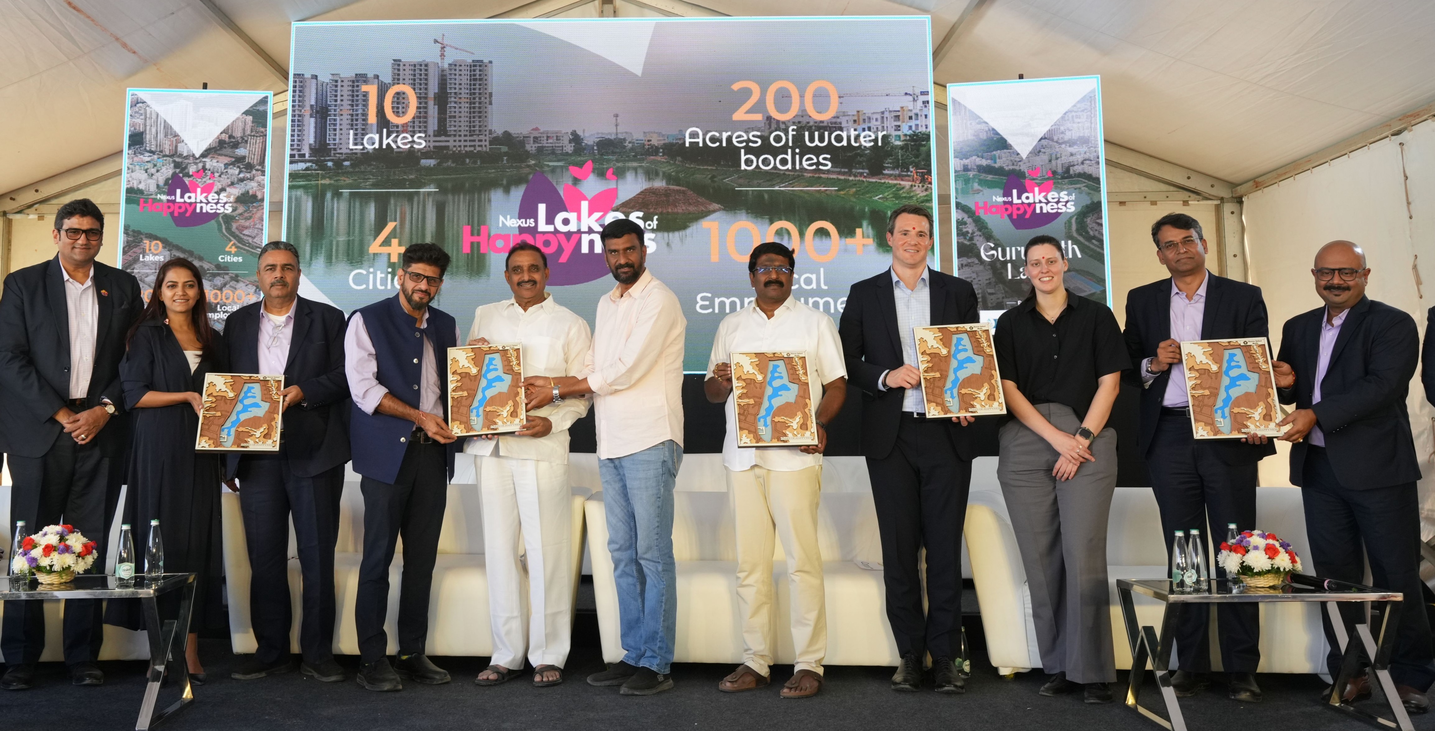Nexus Select Malls Team, Anand Malligavad - the lakeman of India and Shri Gandhi at the launch of the 10th Lake of Happyness in Miyapur
